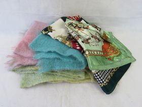 Three mohair scarves and two silken type scarves.