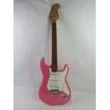 A Westfield electric guitar in pink.
