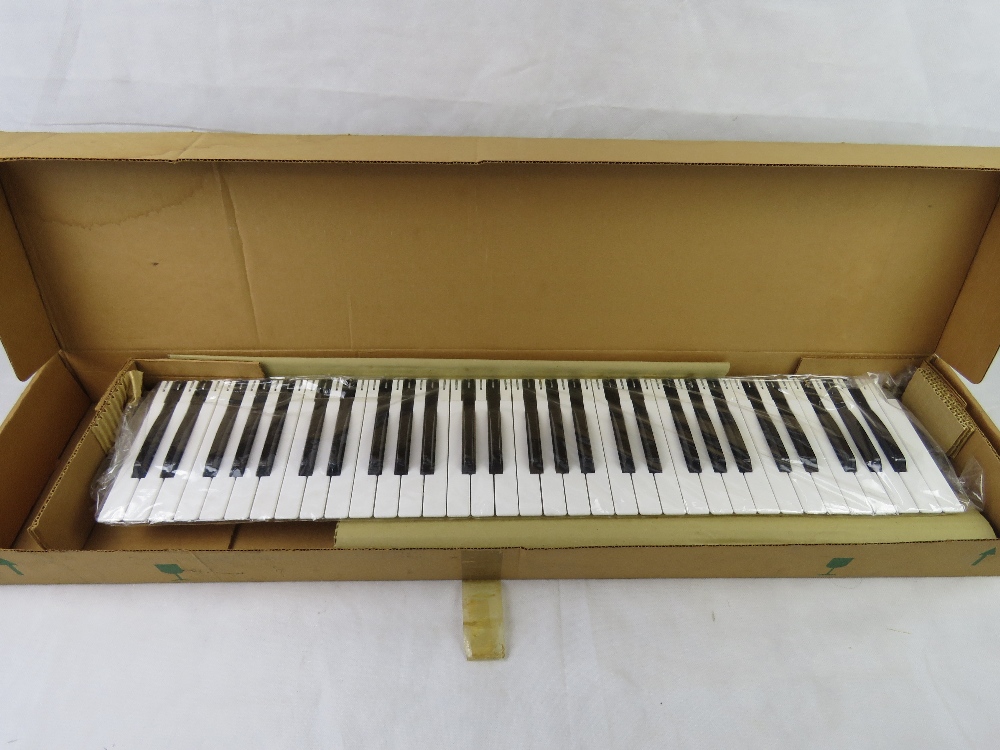 A S.K.A plastic keyboard in original box.