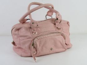 A baby pink leather handbag by Patrick Cox, some marks noted, approx 30cm wide.