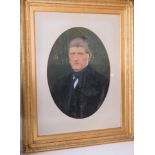 A fine portrait of a Victorian gentleman in black suit, unsigned, mounted in oval slip,