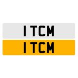 '1 TCM' vehicle registration (1 by 3 number plate) on retention certificate.