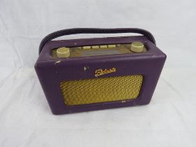 A purple leather Robert Radio.