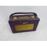 A purple leather Robert Radio.