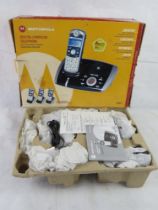 A Motorola digital cordless telephone set in box.