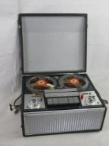 A Ferguson 1:4 tracks 2:3 reel to reel tape recorder.