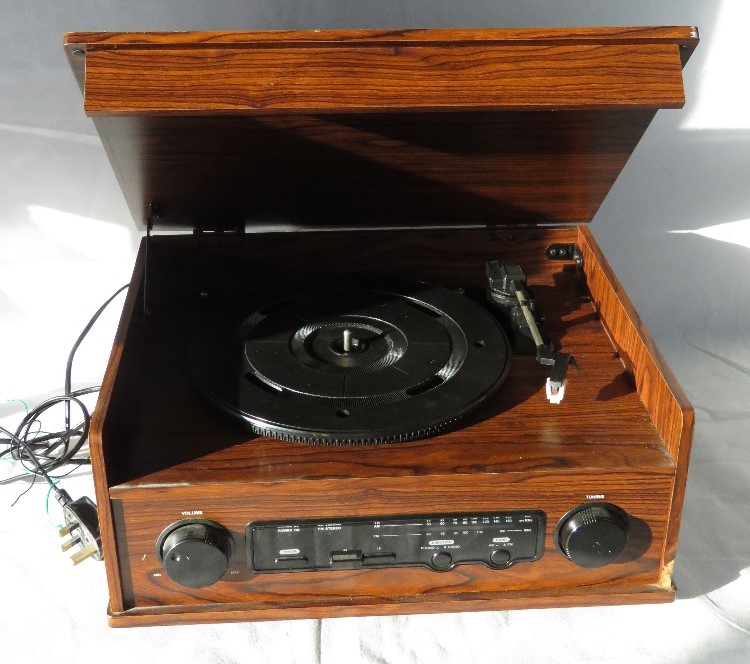 A record player turntable. Disclaimer: electrical items are sold as untested and without guarantee.