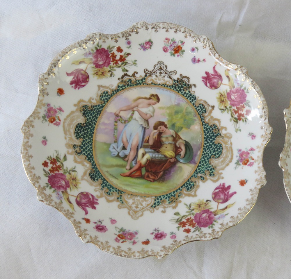A pair of late 19th century Austrian porcelain decorative dishes in the Royal Vienna style, - Image 3 of 6
