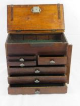 A Wellington chest style collectors cabinet, one side a/f, 40 x 23 x 31cm approx.