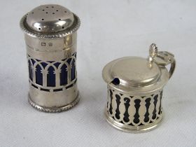 A hallmarked silver pepperette and and hallmarked silver mustard pot,