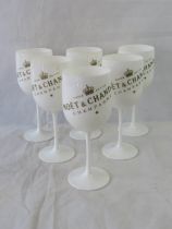 A set of six Moet et Chandon picnic plastic glasses.