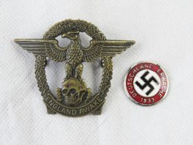 Two military badges; Germany Awake and England Awake.