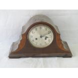 An Edwardian mantle clock with pendulum, key and last service details, 41cm wide.