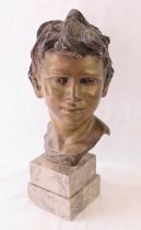 A large bronze bust on marble base of a boy, signed indistinctly to back, 18" (46cm) high.