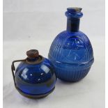 Two Bristol blue glass fire grenades with contents, one marked STAR Hardens Hand Grenade.