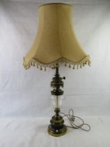 A large vintage glass and brass lamp with shade, approx 1m tall inc shade.