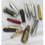 A quantity of assorted utility pocket knives including A Wright & Son Sheffield.