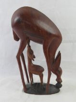 A large wooden Gazelle mother and baby African carving, 45cm high.