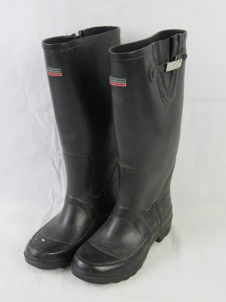 A pair of ladies size 6 Town & Country Wellington boots with starkly buckles.