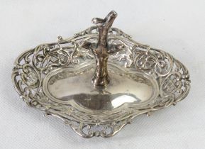 A hallmarked silver ring tray and stand.