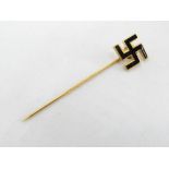 A WWII German black enamel Swastika stick pin.