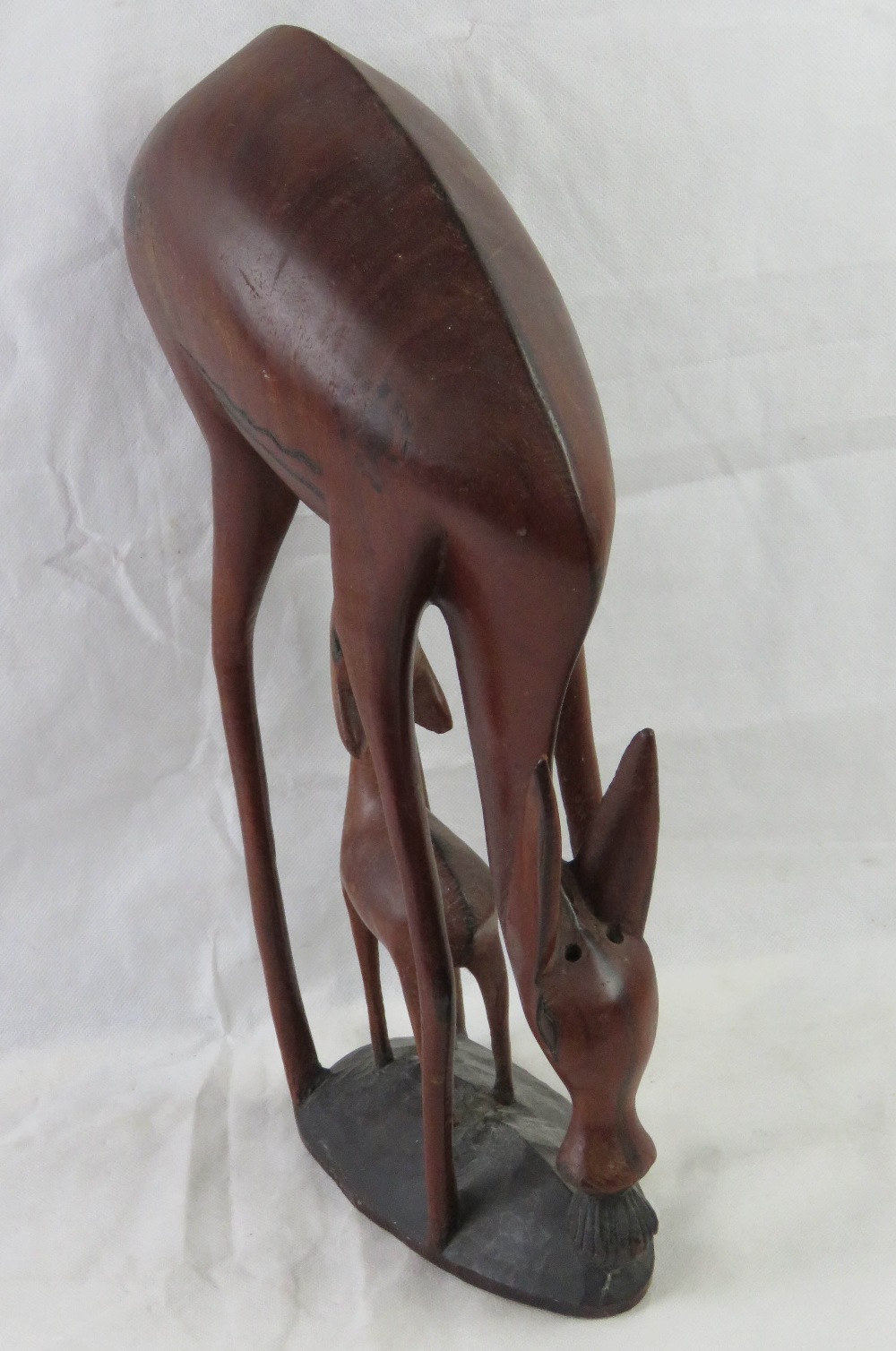 A large wooden Gazelle mother and baby African carving, 45cm high. - Image 2 of 2