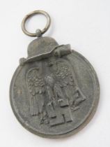 A WWII German Russian Front medal.