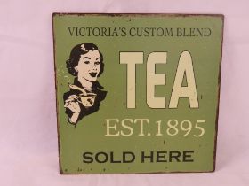 A contemporary metal Tea sign.