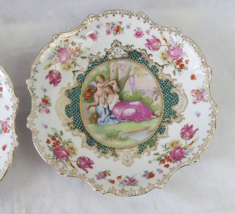 A pair of late 19th century Austrian porcelain decorative dishes in the Royal Vienna style, - Image 2 of 6