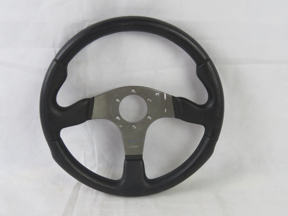A MOMO racing steering wheel type D35.