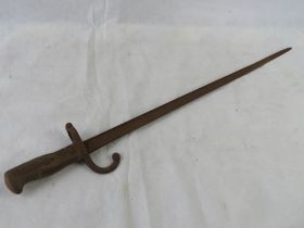 A French M1874 Gras rifle bayonet with hook quillion.