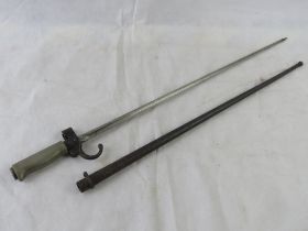 A French 1886 Model Lebel bayonet with scabbard.
