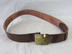 A Russian military belt with brass buckle.