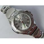 A stainless steel Slazenger wrist watch with original watch having luminous hands and date aperture,