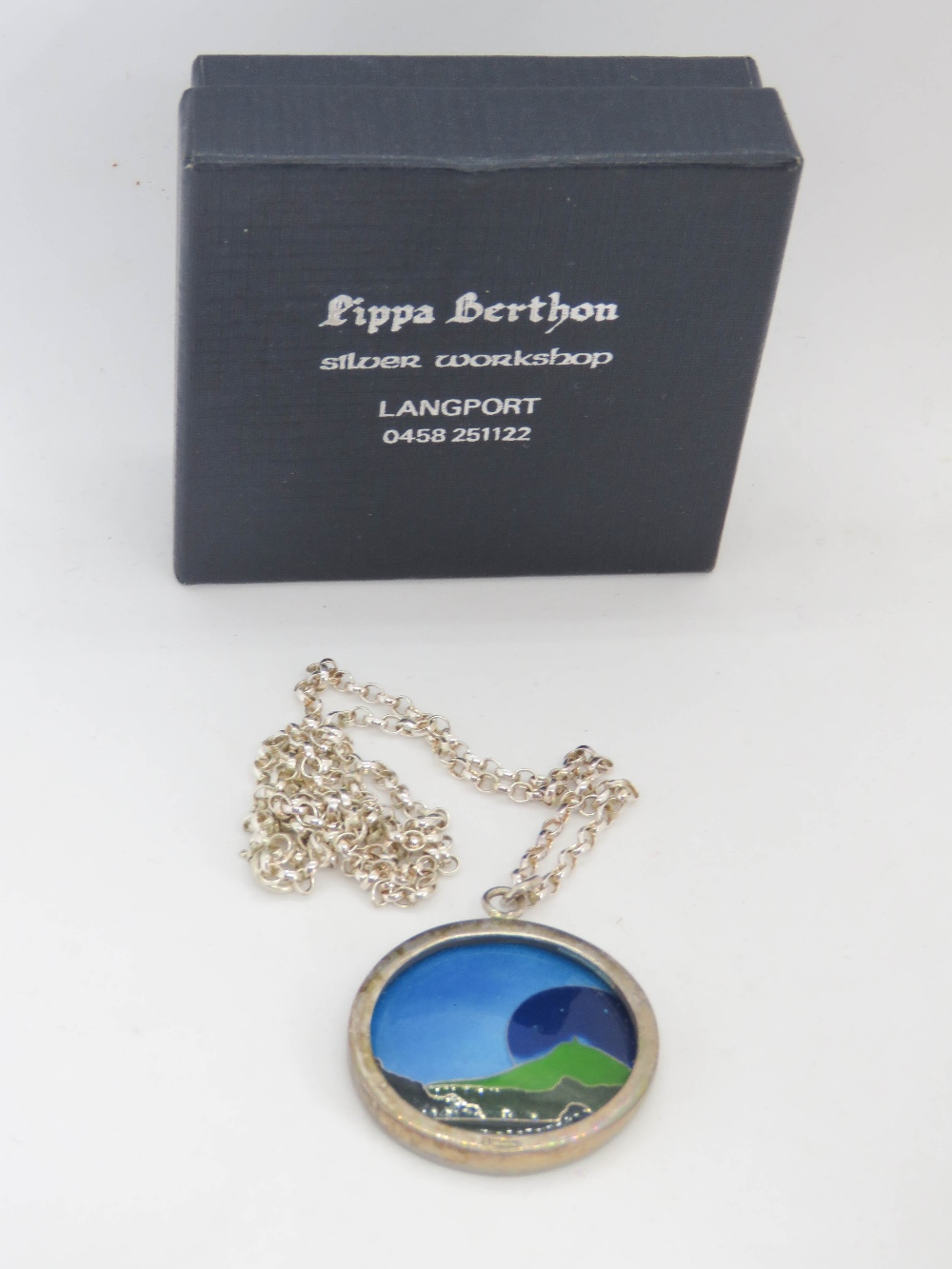 A c1970-80s Pippa Graham - Berthon (Langport) hallmarked silver and enamel pendant, on silver chain,