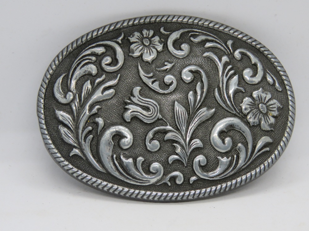 An American made floral belt buckle, marked USA to back.
