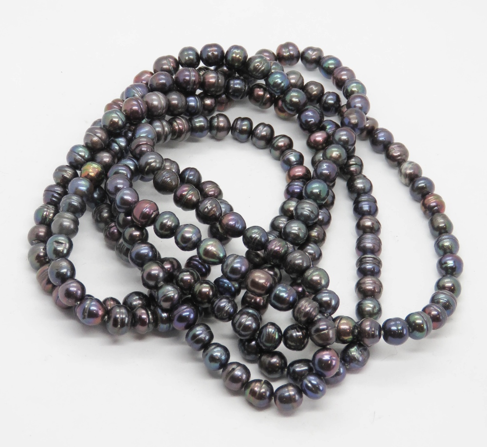 A black/grey mix baroque pearl strand necklace, 150cm.