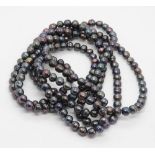 A black/grey mix baroque pearl strand necklace, 150cm.