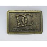 A Dee Cee authentic western wear belt buckle, made in USA by Lewis Corp Palatine, IL.