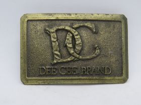 A Dee Cee authentic western wear belt buckle, made in USA by Lewis Corp Palatine, IL.
