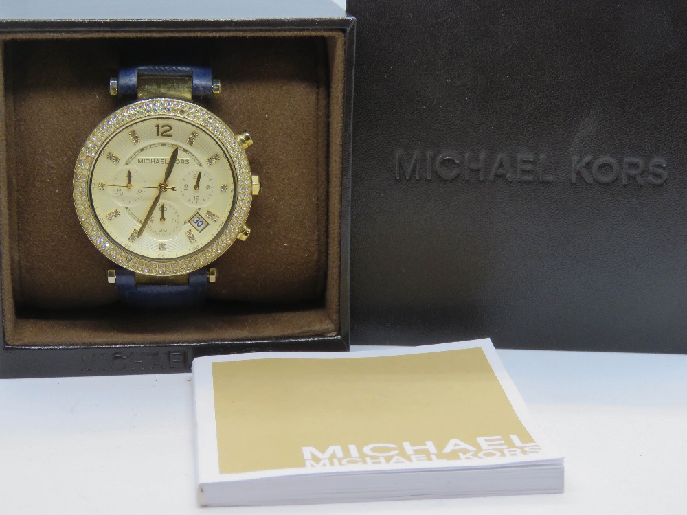 A Michael Kors ladies Parker Blue watch MK2280 with original box and manual.