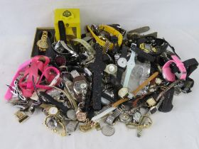 A large collection of assorted wristwatches including Swatch x 2, Casio, Playstation, Garmin x2,