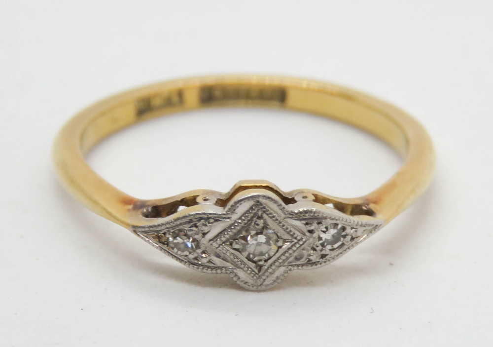 A vintage 18ct gold and platinum diamond ring,