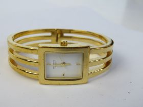 A ladies Identity London bracelet wrist watch.