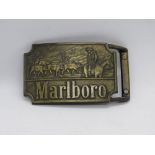 A c1970s Marlboro Cigarettes western belt buckle.