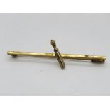 A yellow metal bar brooch, unknown Arabic? mark upon, 3.9g.