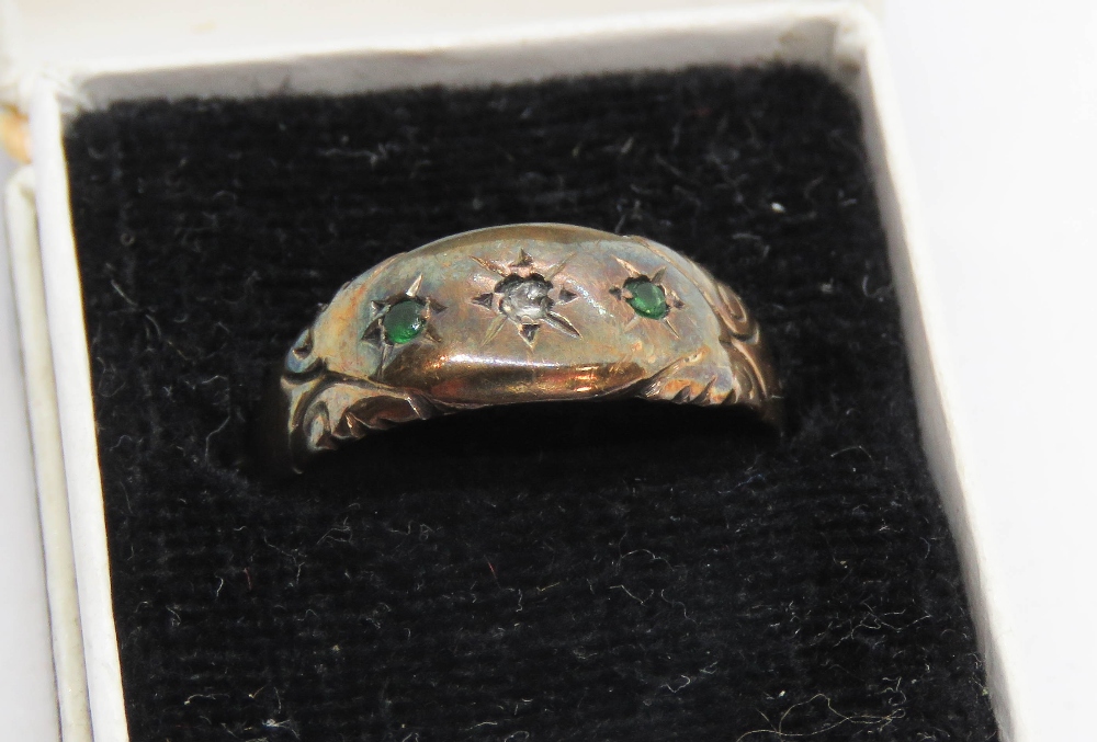 An antique rose metal ring set with three stones, no apparent hallmarks, size M-N, 1.3g. - Image 2 of 2