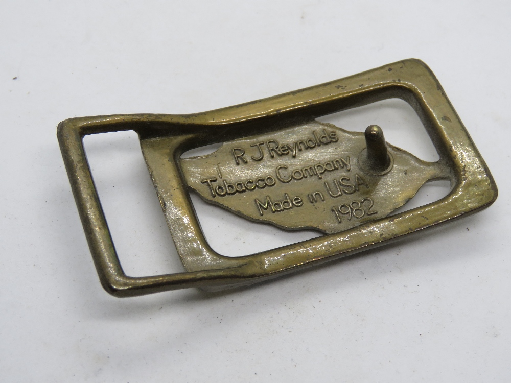 A vintage RJ Reynolds Tobacco USA belt buckle, marked to back with made in USA 1982. - Image 2 of 2