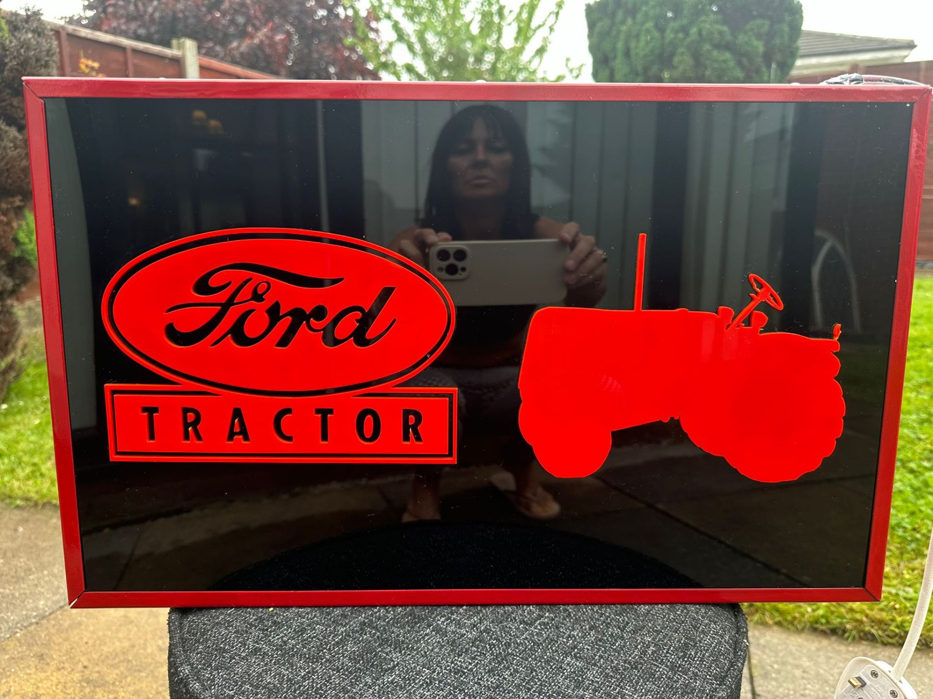 A contemporary Ford Tractor illuminated box sign, approx 50 x 30 x 10cm.