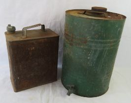 A vintage petrol can with brass BP top together with a vintage oil can with tap.